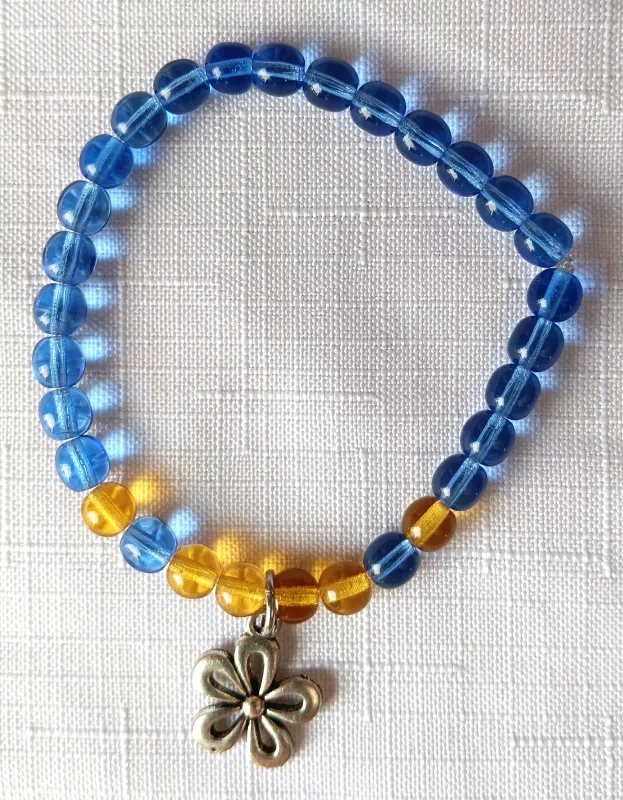 Náramek korálkový - žlutomodrý s kytičkou
